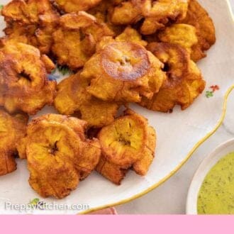 Pinterest graphic of a platter of crispy golden tostones.