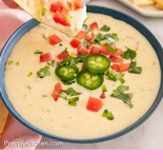 Pinterest graphic of a chip dipped and lifted from a bowl of queso dip.
