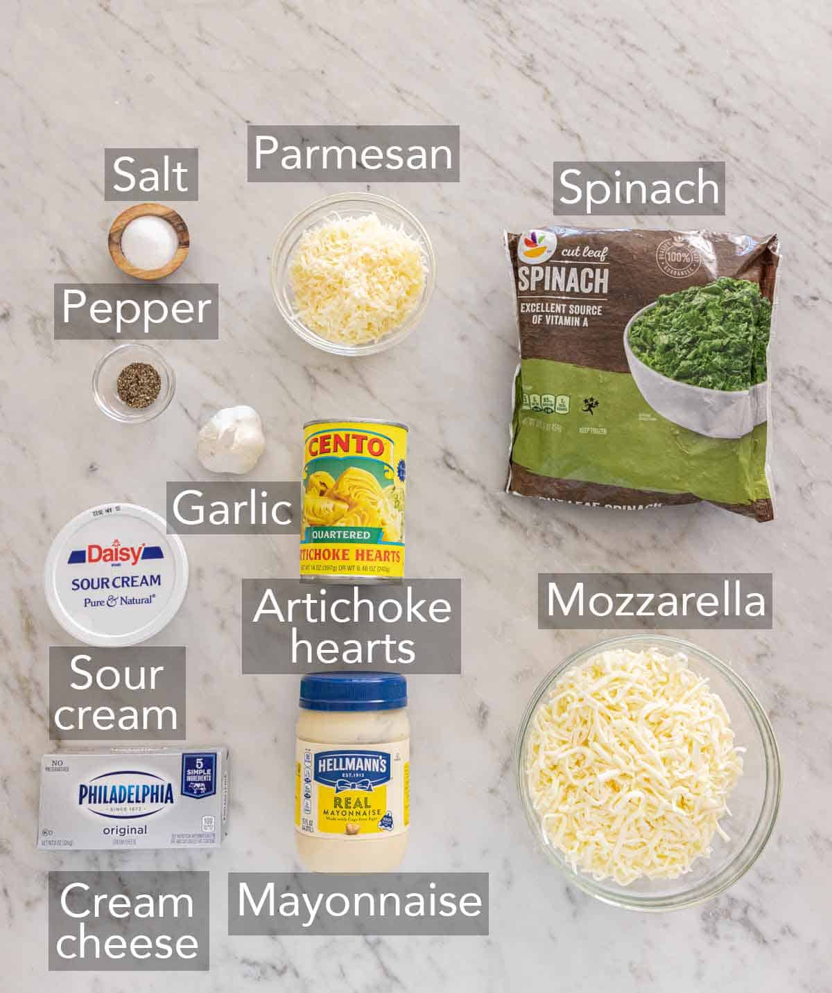 Ingredients needed to make spinach artichoke dip.