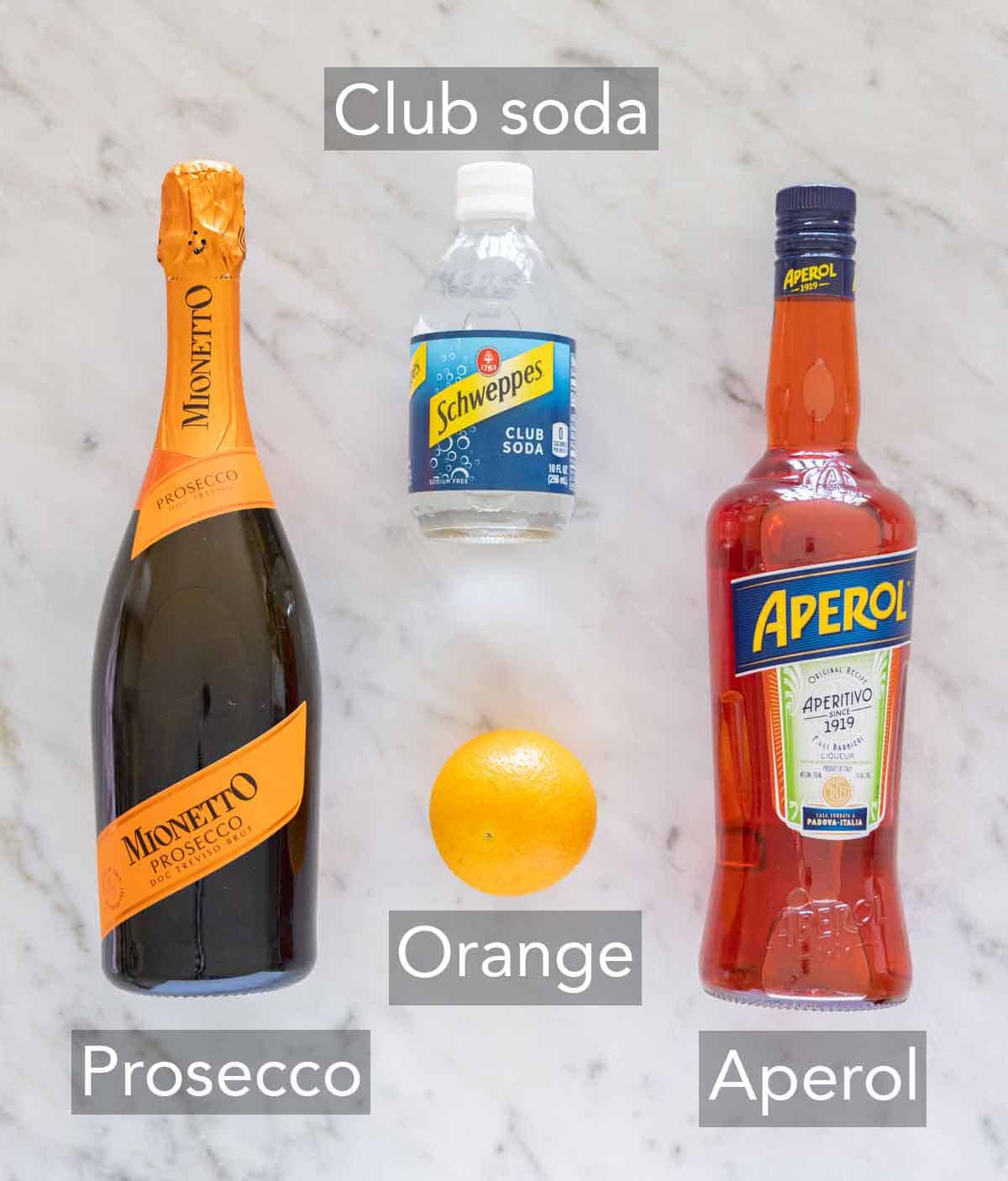 Ingredients needed to make aperol spritz.