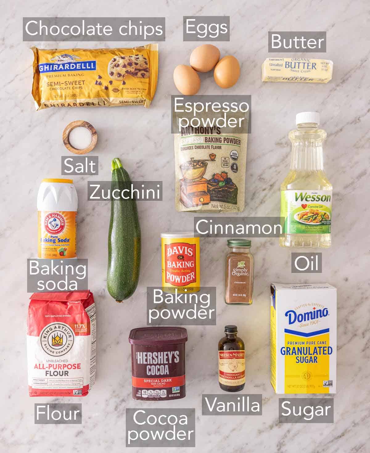 Ingredients needed to make chocolate zucchini bread.
