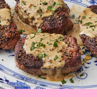 Pinterest graphic of a platter of four steak au poivre with chopped herbs garnished over the sauce.
