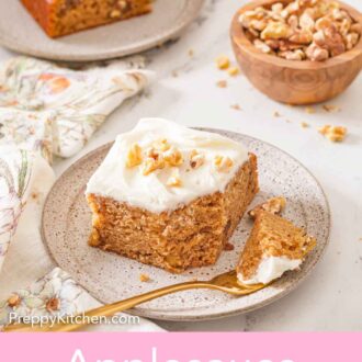 Pinterest graphic of a square piece of applesauce cake on a plate with a bite on a fork in front. A second plate of cake in the back.