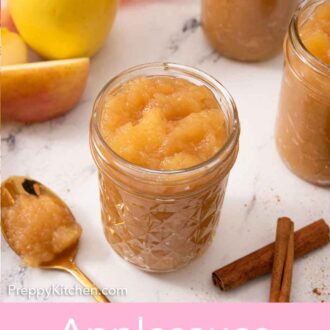 Pinterest graphic of multiple jars of applesauce with one in focus with a spoonful beside it and apples and cinnamon sticks scattered.