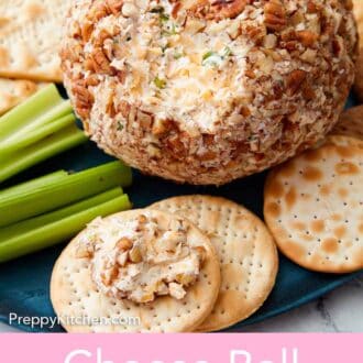 Pinterest graphic of a cheese ball with a portion scooped onto a cracker in front of it.