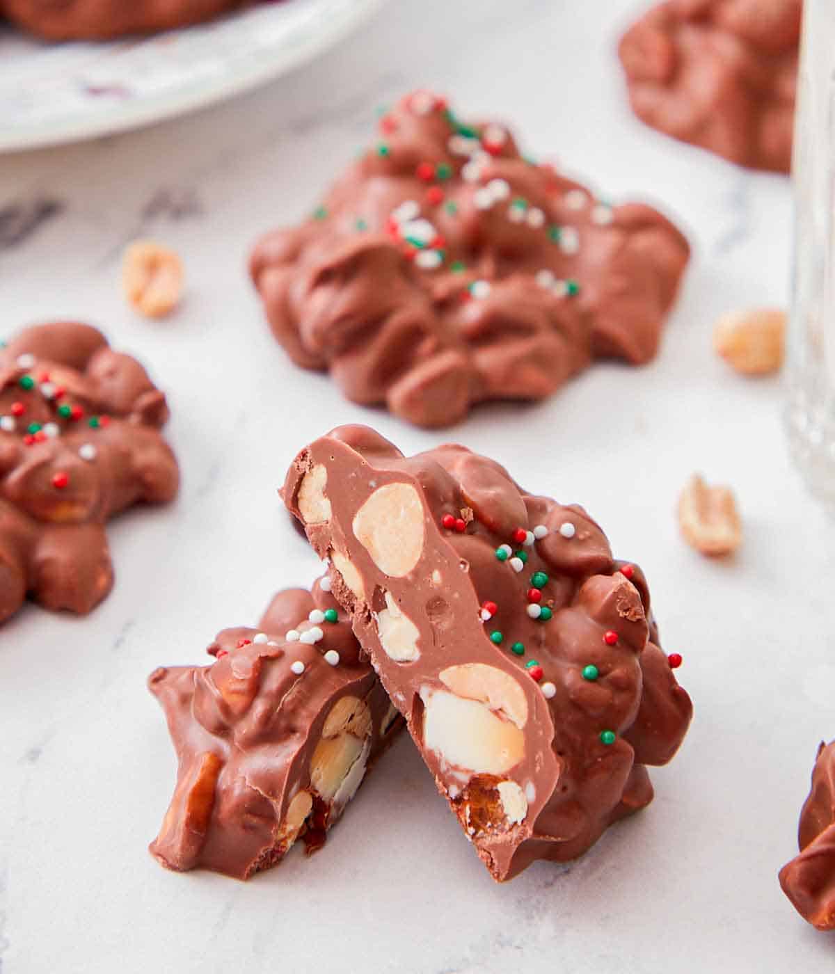 A piece of crockpot candy cut in half, with one half propped up against the other.
