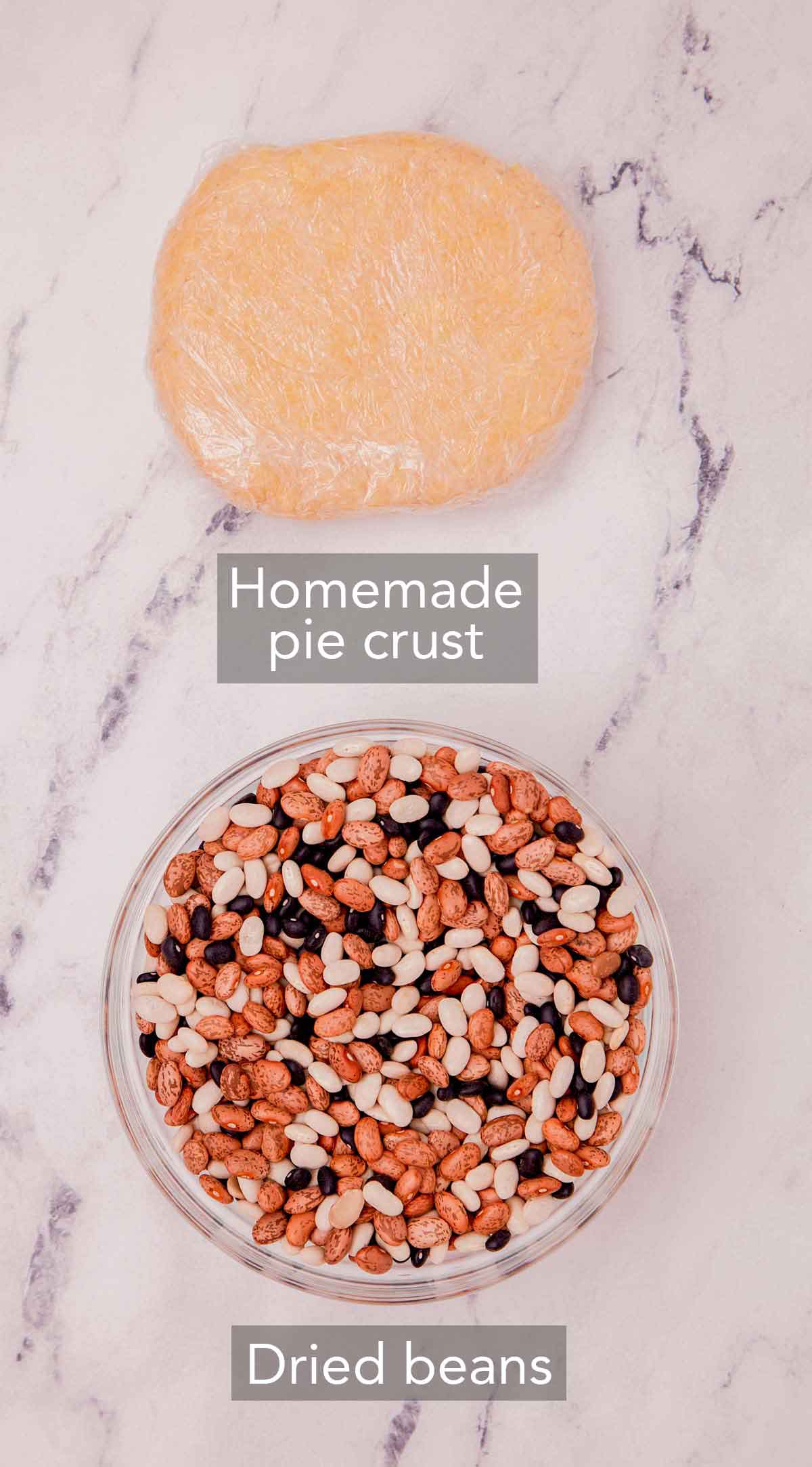 Overhead view of what you need to blind bake a pie crust.