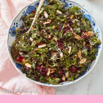 Pinterest graphic of a large bowl of kale salad with a spoon tucked into it.
