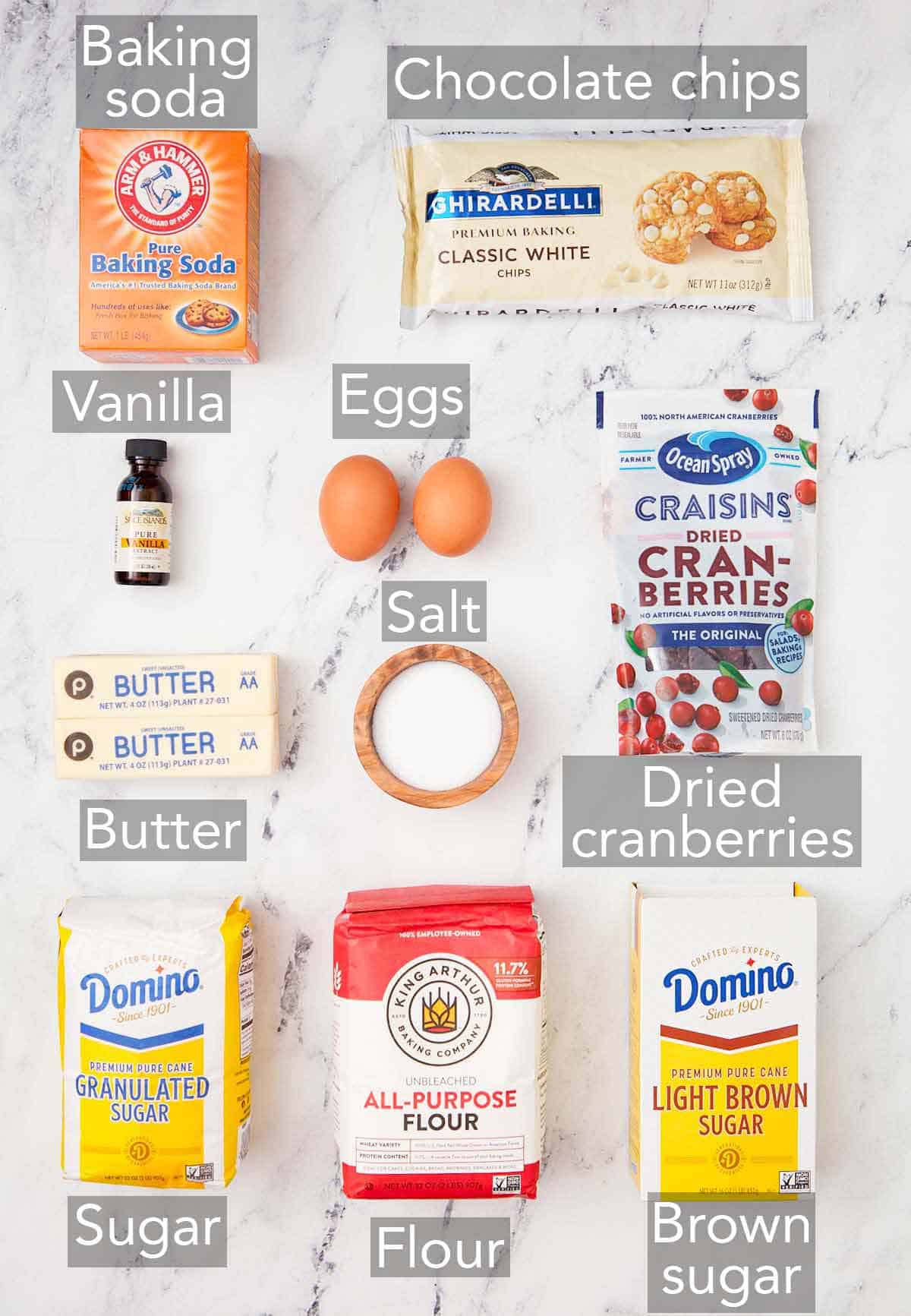Ingredients needed to make white chocolate cranberry cookies.