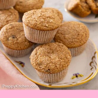 Pinterest graphic of an oval platter of bran muffins.