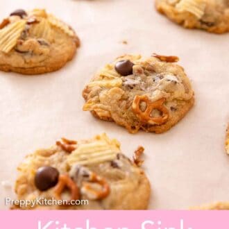 Pinterest graphic of an angled view of multiple kitchen sink cookies in a single layer.