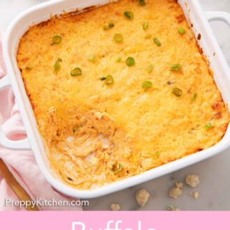 Pinterest graphic of an overhead view of a baking dish with buffalo chicken dip with a corner scooped out.