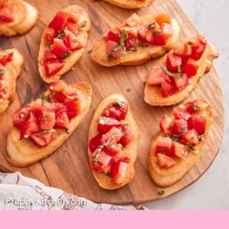 Pinterest graphic of an overhead view of a wooden serving board with bruschetta.