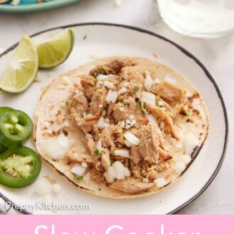 Pinterest graphic of a plate with slow cooker carnitas on a tortilla.