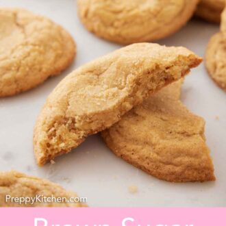 Pinterest graphic of a brown sugar cookie broken in half and stacked on top of each other.