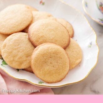 Pinterest graphic of a platter of honey cookies.