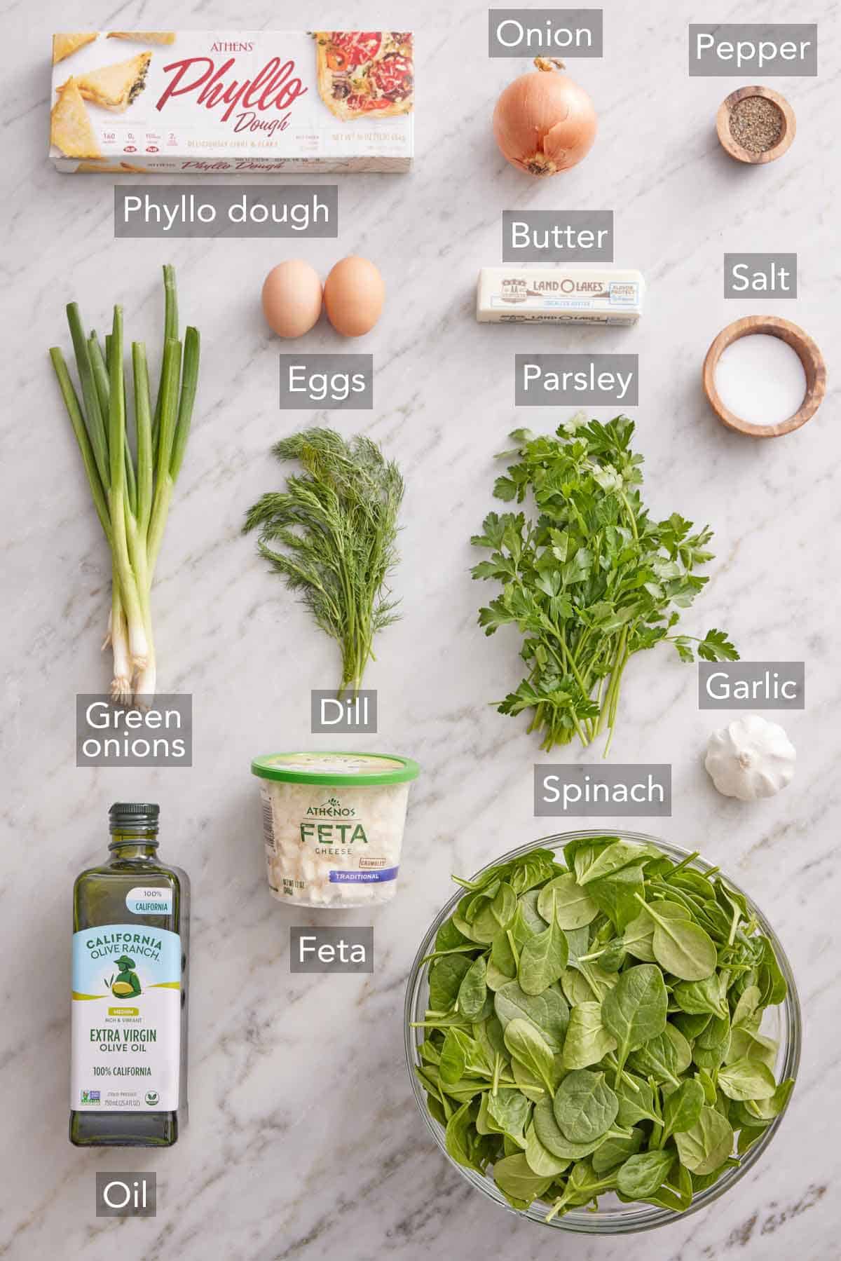 Ingredients needed to make spanakopita.