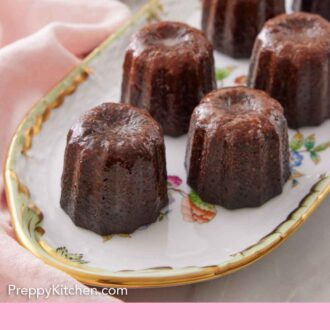 Pinterest graphic of a platter of canelés.