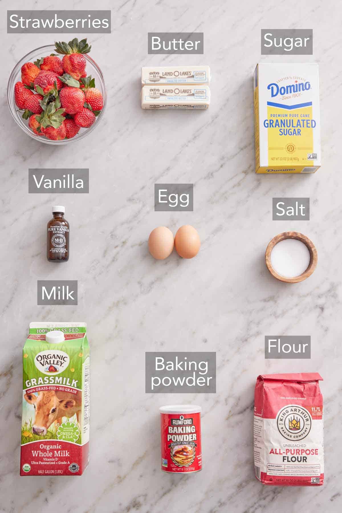Ingredients needed to make strawberry muffins.