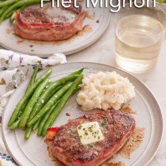 Pinterest graphic of two plates of bacon wrapped filet mignon with mashed potatoes and green beans with one plate in front of the other.