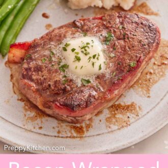 Pinterest graphic of a bacon wrapped filet mignon with a pat of melted butter on top with some green beans and mashed potatoes on the side.