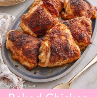 Pinterest graphic of a platter of baked chicken thighs with a plate of green beans and stack of dishes with forks in the background.