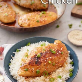 Pinterest graphic of a bowl of rice with a honey garlic chicken breast on top with sesame seeds and green onions as garnish.