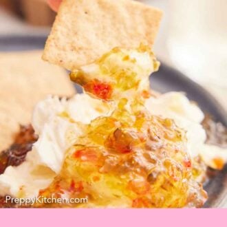 Pinterest graphic of a cracker dipped into some jalapeno jelly on a plate.