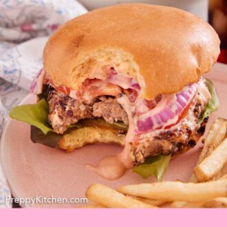 Pinterest graphic of a veggie burger with a bite taken out of it.