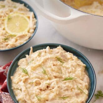 Pinterest graphic of a bowl of avgolemono with a large pot and second bowl of avgolemono in the background.