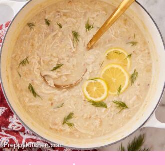 Pinterest graphic of an overhead view of a pot of avgolemono garnished with dill and lemon slices.