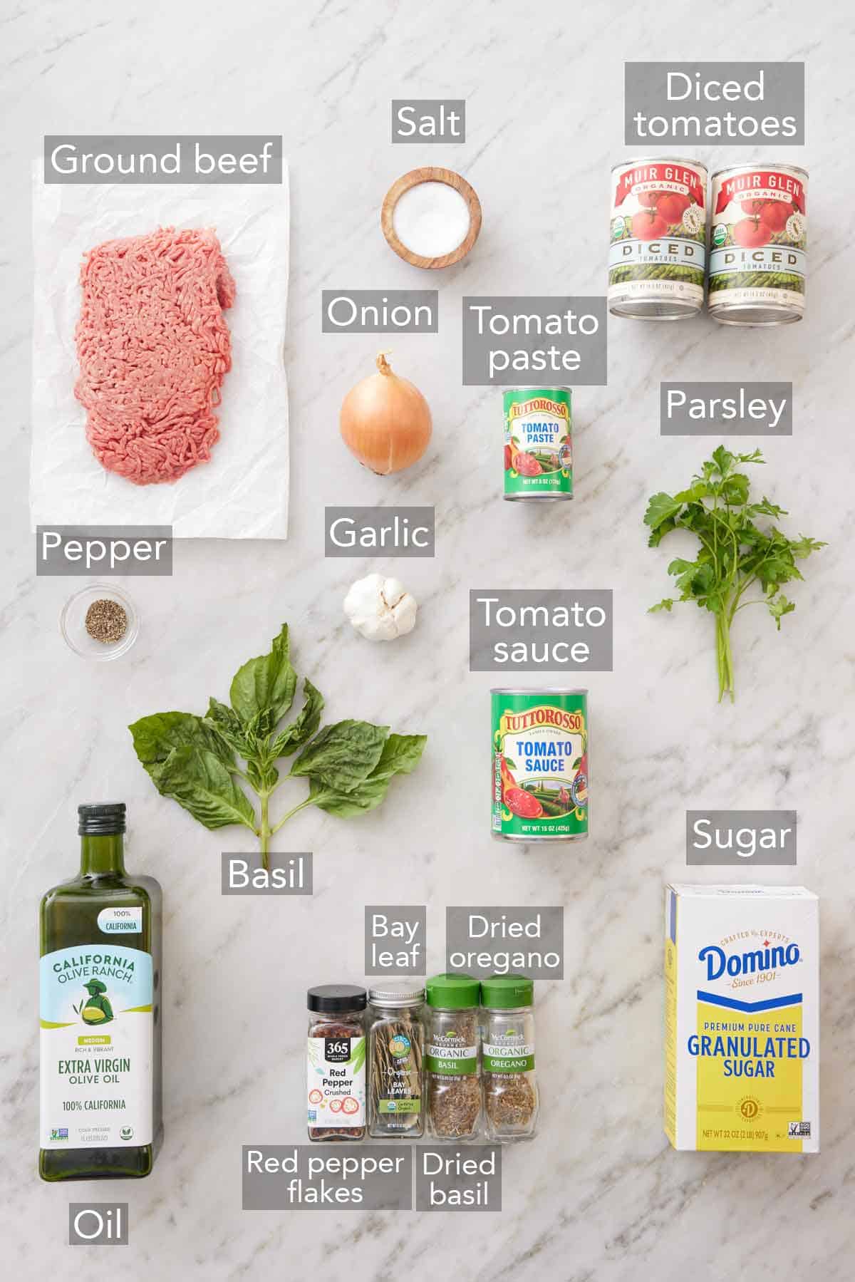 Ingredients needed to make spaghetti sauce.