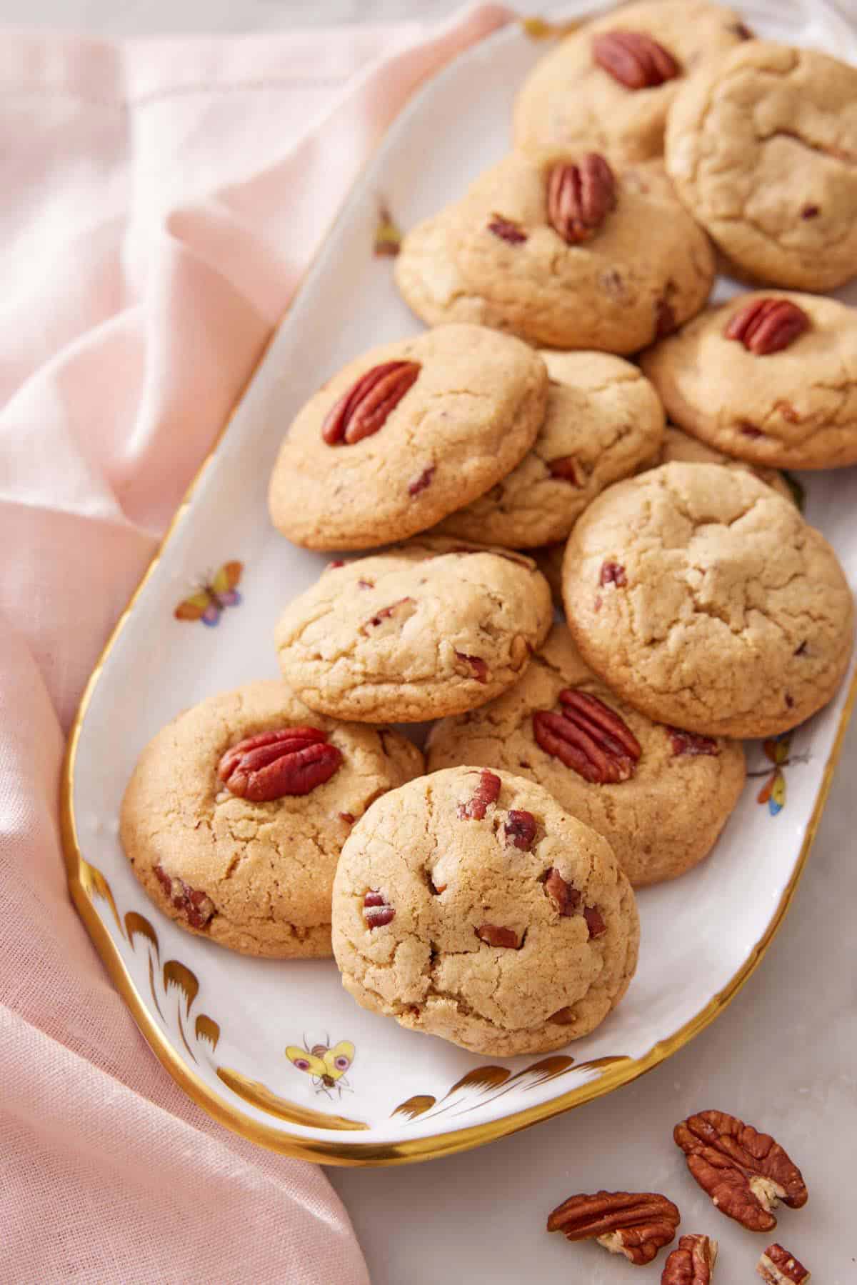 A long oval platter of butter pecan cookies.
