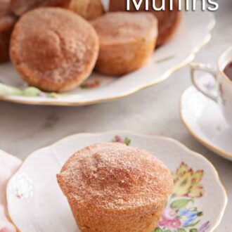 Pinterest graphic of a plate with a cinnamon muffin with a platter in the back along with coffee.