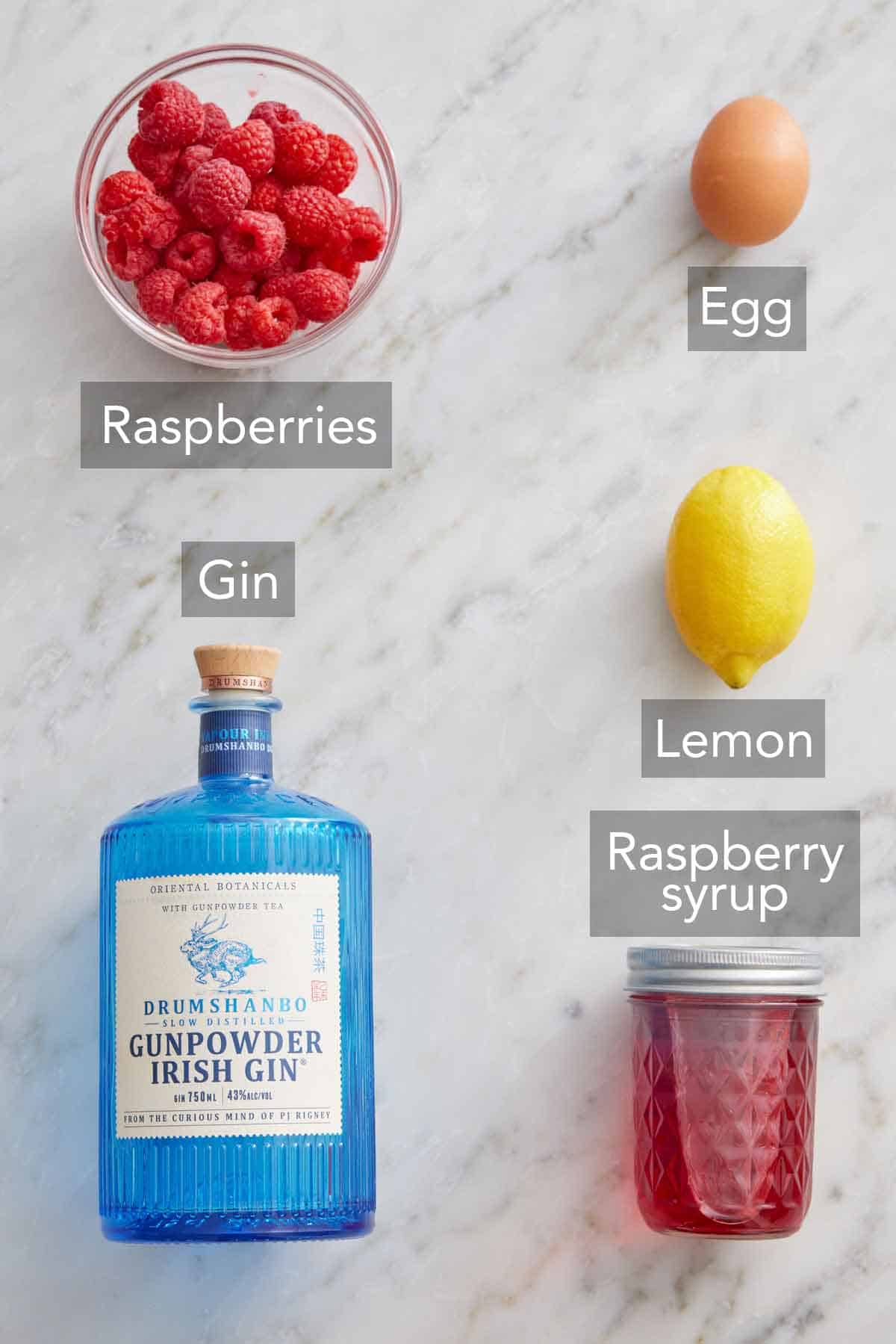 Ingredients needed to make Clover Club Cocktail.