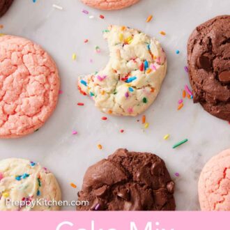 Pinterest graphic of an overhead view of multiple cake mix cookie in a single layer. Cookie in the middle has sprinkles and a bite taken out.