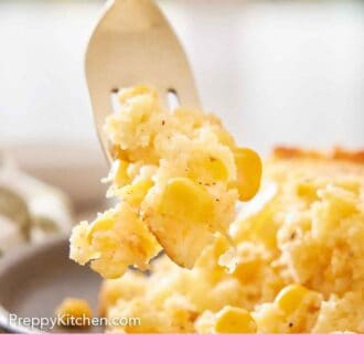 Pinterest graphic of a forkful of corn casserole lifted from a plate.
