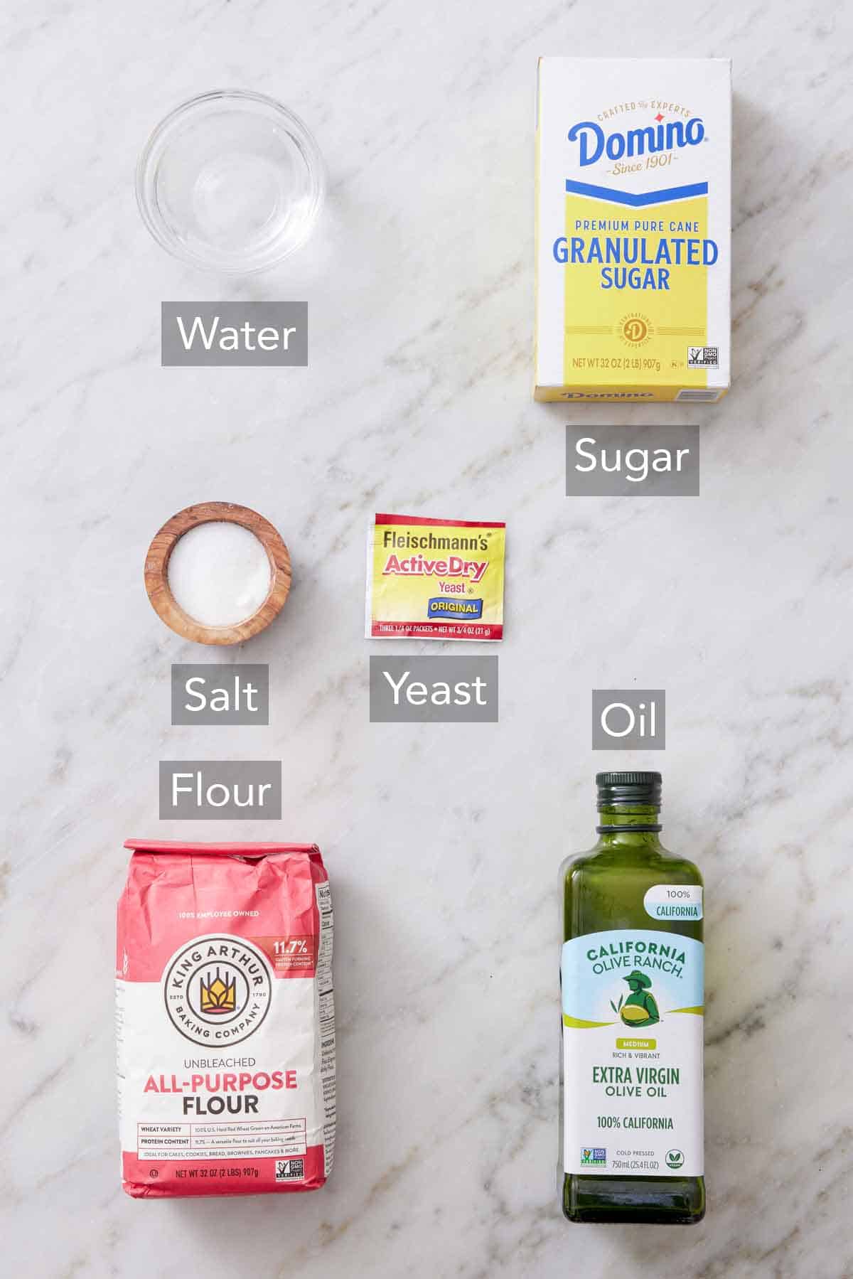 Ingredients needed to make French bread.