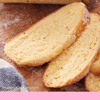 Pinterest graphic of a cutting board with a loaf of Pan de Muerto sliced.
