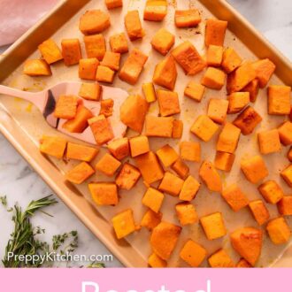 Pinterest graphic of a sheet pan of roasted butternut squash with a spatula tucked underneath a couple.