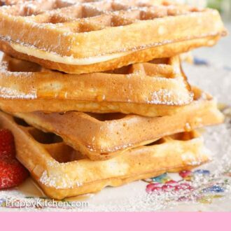 Pinterest graphic of a side view of a stack of waffles with powdered sugar dusted on top.
