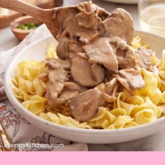 Pinterest graphic of beef stroganoff spooned over egg noodles.