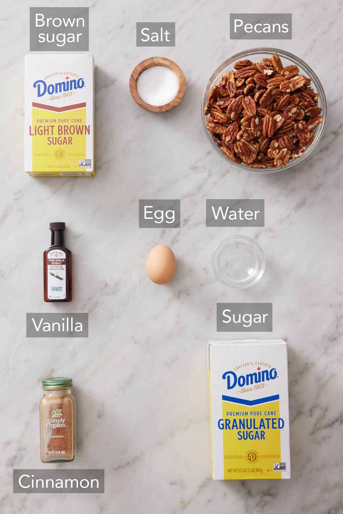 Ingredients needed to make candied pecans.