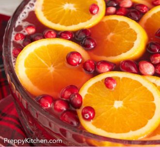 Pinterest graphic of a punch bowl containing Christmas punch.