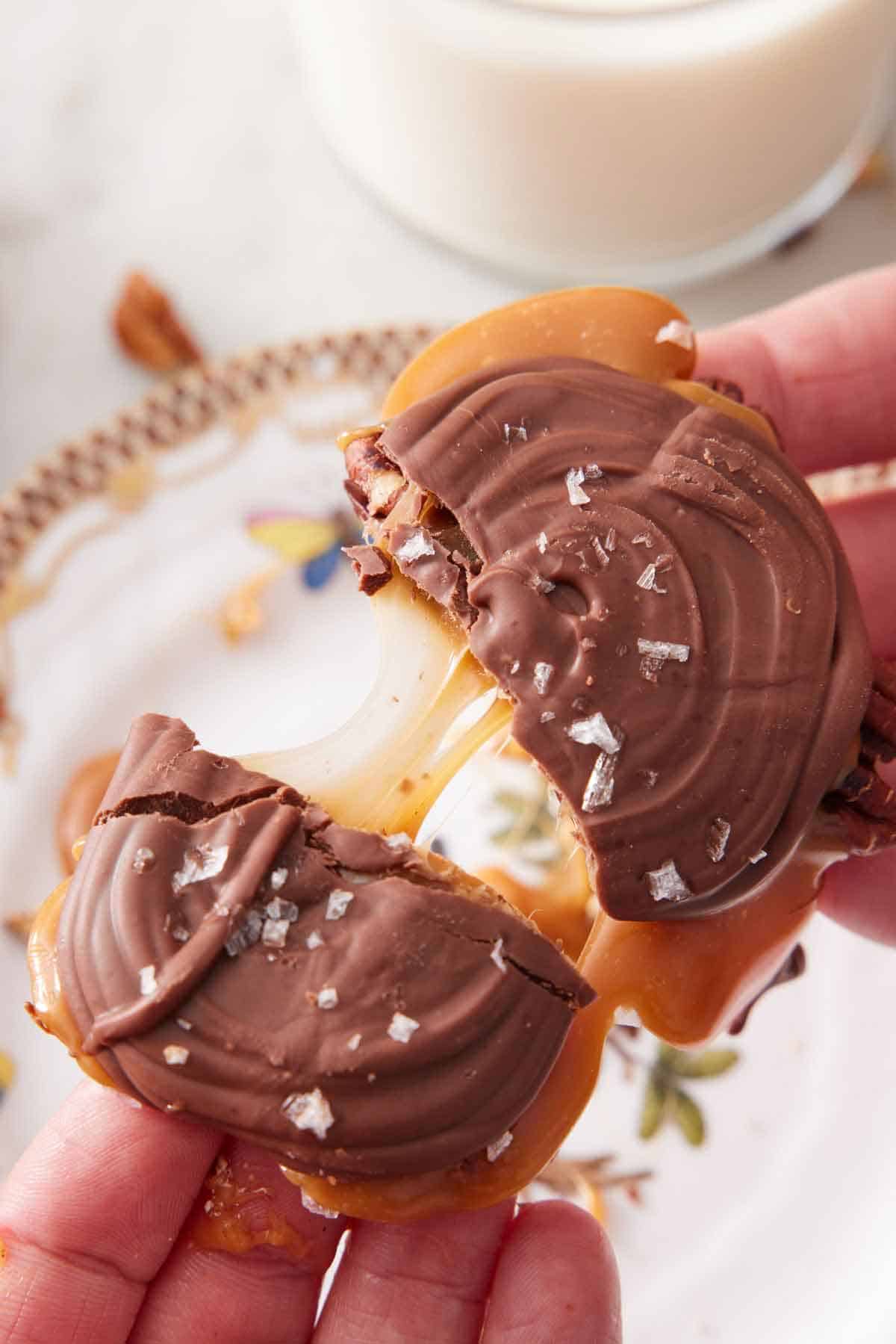 A turtle torn in half showing the melty caramel center.