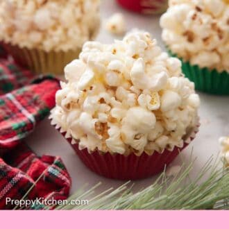 Pinterest graphic of popcorn balls in colorful cupcake liners.