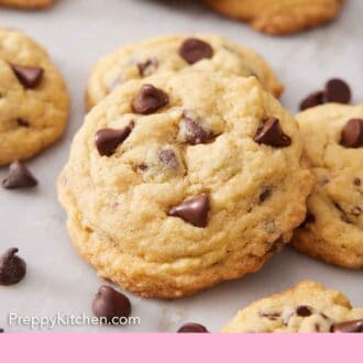 Pinterest graphic of multiple pudding cookies with chocolate chips scattered around.