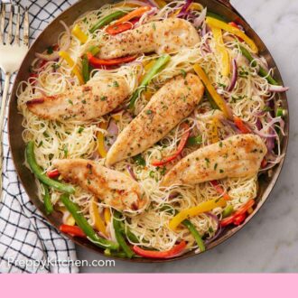 Pinterest graphic of a skillet of chicken scampi topped with chopped parsley.