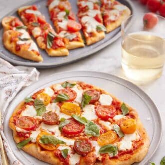 Pinterest graphic of plate with a flatbread pizza with a second plate in the background, cut into long slices.