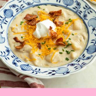 Pinterest graphic of a bowl of potato soup with sour cream, cheese, bacon, and chives on top.